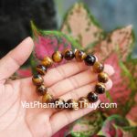 S6837-chuoi-mat-meo-vang-nau-12li